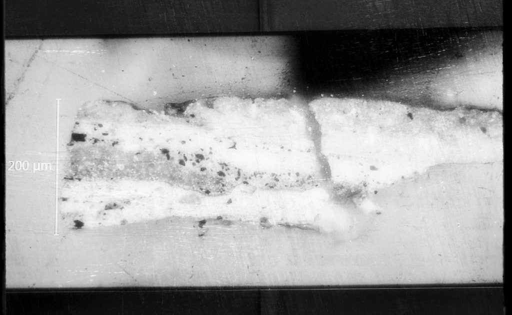 Tiny pigment fragment from 'Milliners' by Edgar Degas.